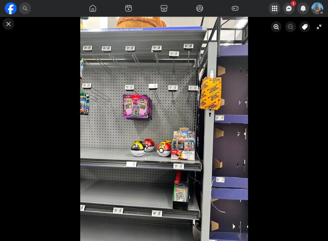 Shelf photo: Poke Ball tins + booster bundle at Walmart